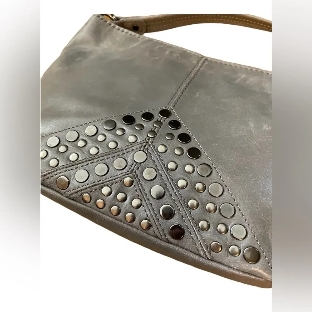 The Sak Indio Grey Leather Studded Hobo Bag With Tassel